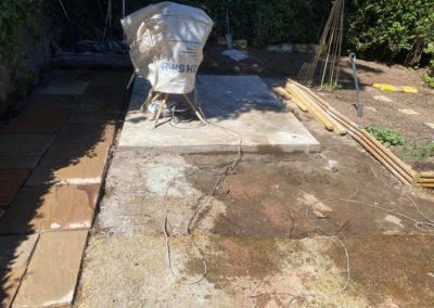 Cement mixer on greenhouse concrete pad