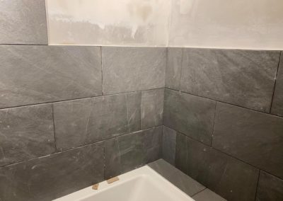 Fitting bathroom tiles around bath