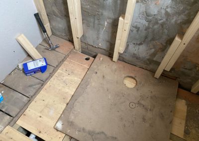 Constructing floor for new shower unit