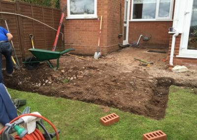 Digging out foundations for patio