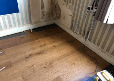 Laying new wooden flooring