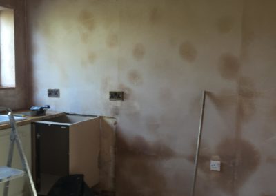 Fresh plaster on kitchen walls
