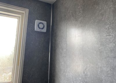 Grey tiled walls on bathroom rennovation