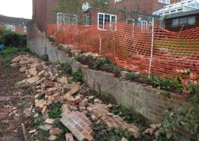 Repair to collapsed garden wall