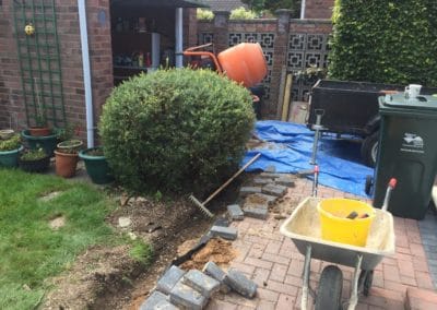 Laying brick path with blue brick border