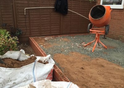 Foundation for patio with brick border