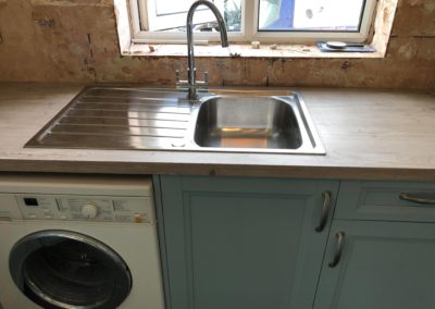 Fitted sink and cabinets