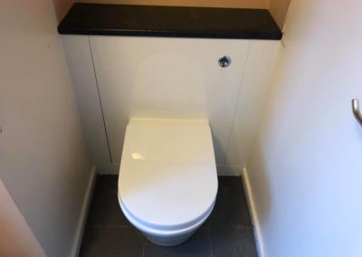 Finished toilet and cistern unit
