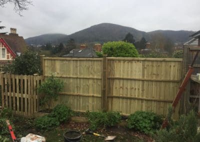 Wooden fence with Malvern Hills in background