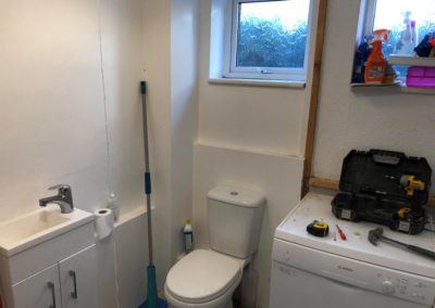 Fitting new toilet and sink unit