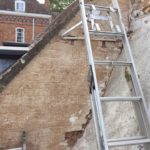 Repair work to lose cement on chimney breast