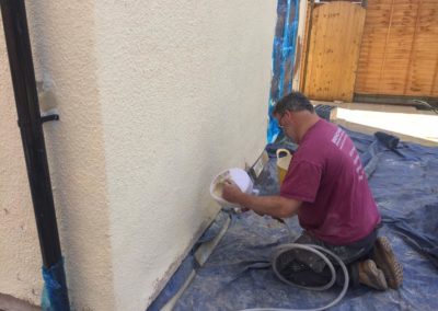 Mixing and applying damp proofing and paint
