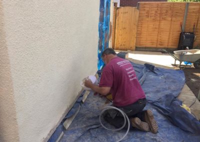 Mixing and applying damp proofing and paint