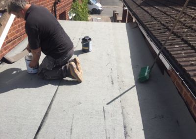 Repairing and damp proofing flat roof