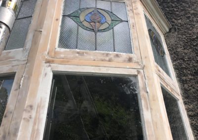 Repair to Grade 2 listed window with stained glass