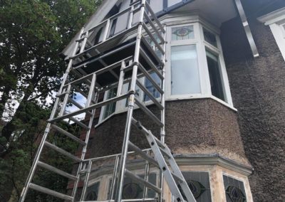 Repair to Grade 2 listed window with stained glass