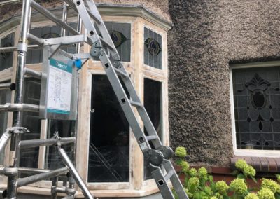 Repair to Grade 2 listed window with stained glass