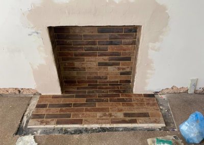 Fireplace replacement and tiling