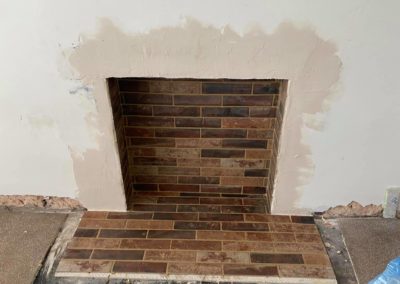 New tiling around fire place