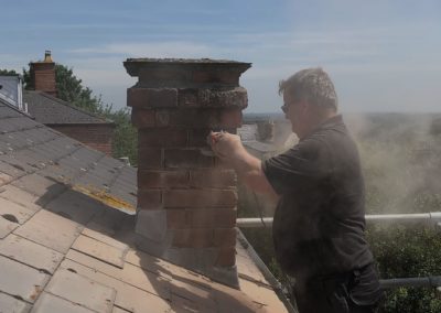 Simon repairing chimney