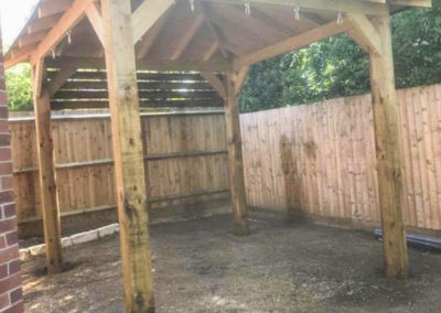 Gazebo with wood fencing during construction