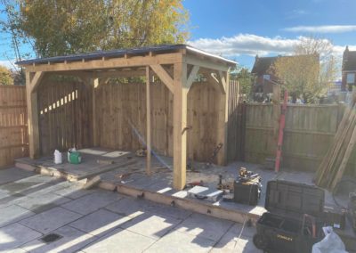 Gazebo construction in Tewkesbury bordering neighbour's fence